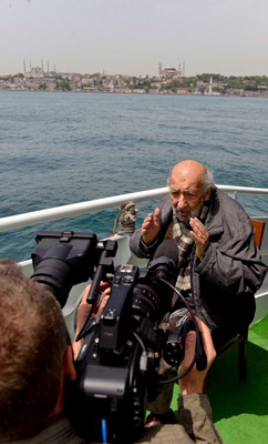 Ara Guler on the boat with cameraman